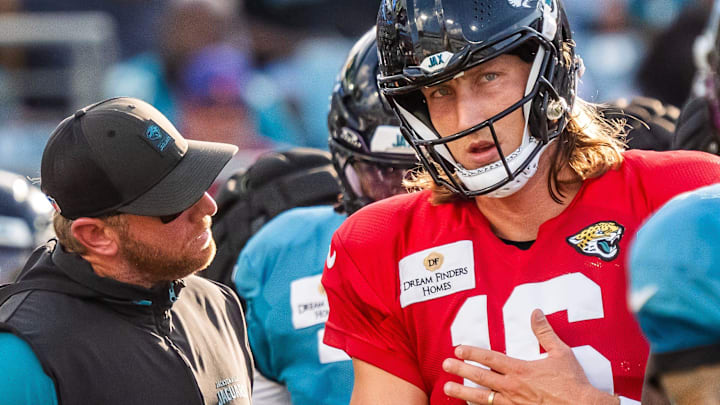 Jacksonville Jaguars head coach Liam Coen talks with Jacksonville Jaguars quarterback Trevor Lawrence (16) between plays before an NFL scrimmage at EverBank Stadium Friday August 1, 2025, in Jacksonville, Fla. [Doug Engle/Florida Times-Union]