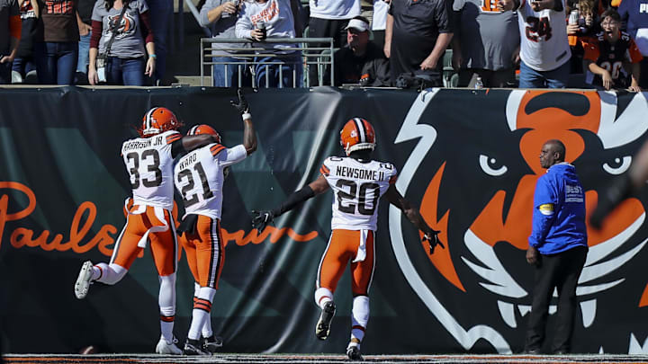 Nov 7, 2021; Cincinnati, Ohio, USA; Cleveland Browns cornerback Denzel Ward (21) reacts with fellow cornerbacks Greg Newsome II and Martin Emerson Jr. Nov 7, 2021; Cincinnati, Ohio, USA; Cleveland Browns cornerback Denzel Ward (21) reacts with fellow cornerbacks Greg Newsome II and Martin Emerson Jr.