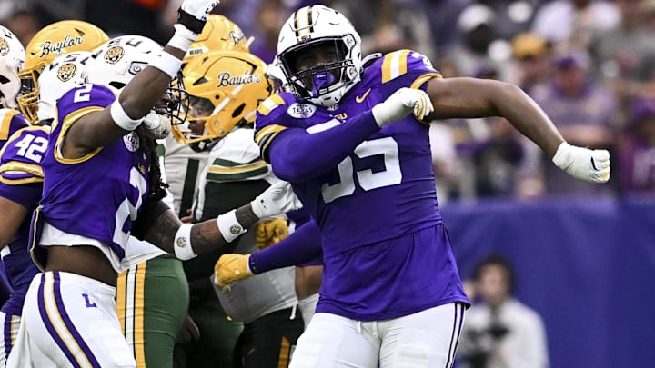 Dec 31, 2024; Houston, TX, USA; LSU Tigers defensive end Sai'vion Jones (35) rects during the first half against the Baylor Bears at NRG Stadium. Mandatory Credit: Maria Lysaker-Imagn Images 