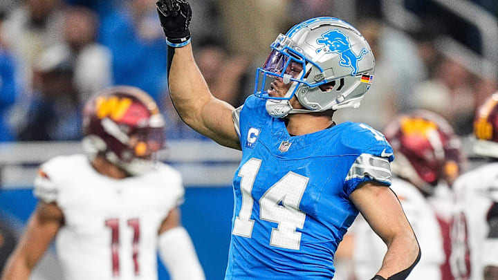 Detroit Lions wide receiver Amon-Ra St. Brown (14) celebrates a first down against Washington Commanders during the first half of the NFC divisional round at Ford Field in Detroit on Saturday, Jan. 18, 2025.