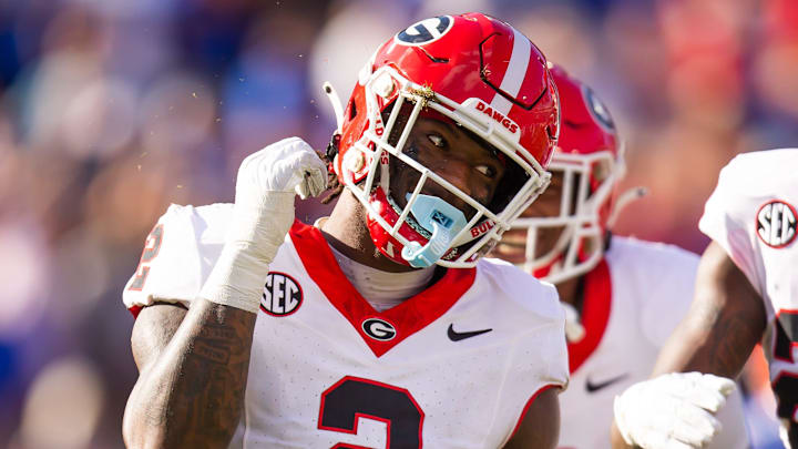 Georgia Bulldogs linebacker Smael Mondon Jr. (2) celebrates his tackle of Florida Gators running