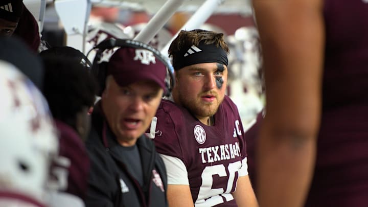 Sep 28, 2024; Arlington, Texas, USA; Texas A&M Aggies offensive lineman Trey Zuhn III (60) sits on the bench during the Southwest Classic against the Arkansas Razorbacks at AT&T Stadium. Sep 28, 2024; Arlington, Texas, USA; Texas A&M Aggies offensive lineman Trey Zuhn III (60) sits on the bench during the Southwest Classic against the Arkansas Razorbacks at AT&T Stadium.
