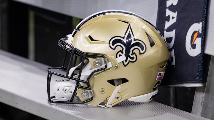 Nov 5, 2023; New Orleans, Louisiana, USA;  Detailed view of the New Orleans Saints helmet on the team bench against the Chicago Bears during the first half at the Caesars Superdome. Mandatory Credit: Stephen Lew-Imagn Images