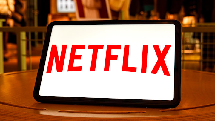 In this photo illustration, a Netflix logo is  seen
