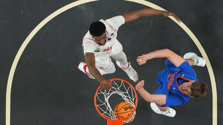Apr 7, 2025; San Antonio, TX, USA;  Houston Cougars forward J'Wan Roberts (13) dunks against Florida Gators forward Alex Condon (21) in the second half in the national championship game of the Final Four of the 2025 NCAA Tournament at the Alamodome. Mandatory Credit: Robert Deutsch-Imagn Images