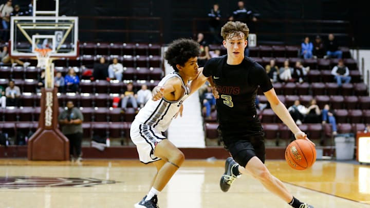 Logan-Rogersville's Chase Branham drives to the basket as the Wildcats took on the Sparta Trojans at Hammons Student Center in a first round Blue Division matchup during the Blue and Gold Tournament on Thursday, Dec. 26, 2024.