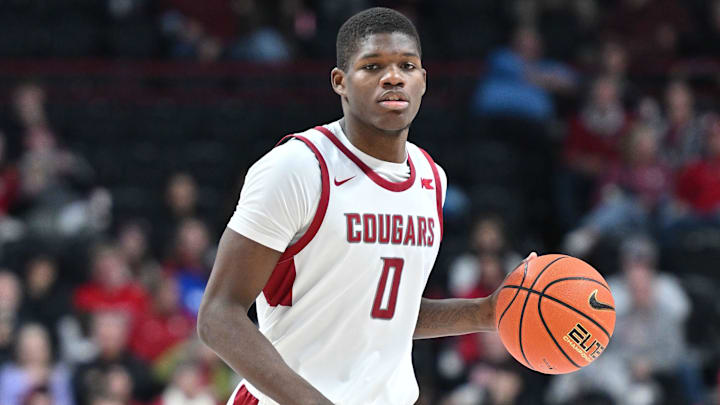 Nov 21, 2024; Spokane, Washington, USA; Washington State Cougars guard Cedric Coward (0) controls the ball against the Eastern Washington Eagles in the second half at Spokane Veterans Memorial Arena. Mandatory Credit: James Snook-Imagn Images Nov 21, 2024; Spokane, Washington, USA; Washington State Cougars guard Cedric Coward (0) controls the ball against the Eastern Washington Eagles in the second half at Spokane Veterans Memorial Arena. Mandatory Credit: James Snook-Imagn Images