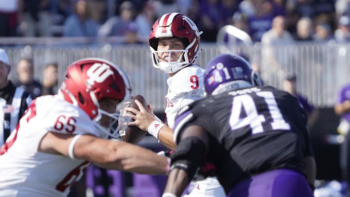 Indiana Hoosiers quarterback Kurtis Rourke (9) drops back to pass against the Northwestern Wildcats during the first half at Lanny and Sharon Martin Stadium.
