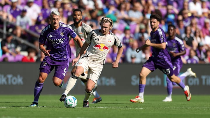 Apr 12, 2025; Orlando, Florida, USA; New York Red Bulls midfielder Emil Forsberg (10) controls the ball against Orlando City in the first half at Inter&Co Stadium. Mandatory Credit: Nathan Ray Seebeck-Imagn Images