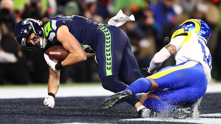 Jan 25, 2026; Seattle, WA, USA; Seattle Seahawks wide receiver Jake Bobo (19) makes a catch for a touchdown against Los Angeles Rams cornerback Cobie Durant (14) during the second half in the 2026 NFC Championship Game at Lumen Field.