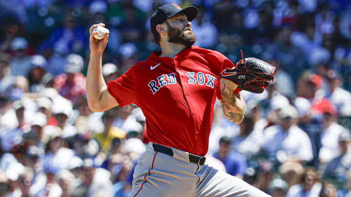 Boston Red Sox starting pitcher Lucas Giolito (54) delivers a pitch against the Chicago Cubs during the first inning at Wrigley Field.