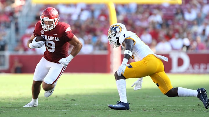 Sep 9, 2023; Fayetteville, Arkansas, USA; Arkansas Razorbacks tight end Luke Hasz (9) runs after a catch during the fourth quarter against the Kent State Golden Flashes at Donald W. Reynolds Razorback Stadium. Arkansas won 28-6. Mandatory Credit: Nelson Chenault-Imagn Images