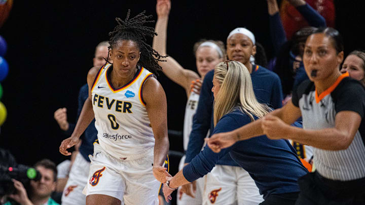 Jun 4, 2023; Indianapolis, Indiana, USA; Indiana Fever guard Kelsey Mitchell (0) celebrates a three
