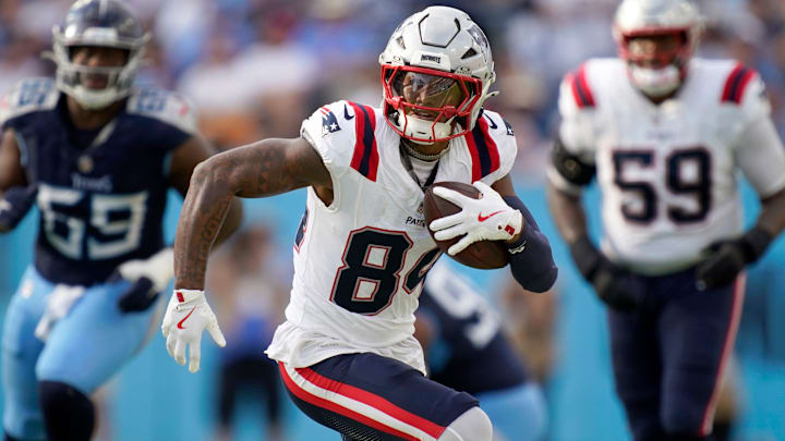 New England Patriots wide receiver Kendrick Bourne (84) runs the ball against the Tennessee Titans at Nissan Stadium.