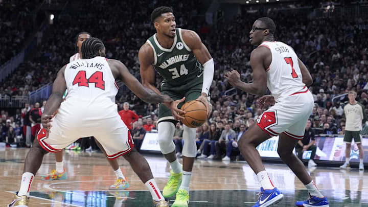 Milwaukee Bucks forward Giannis Antetokounmpo (34) drives against Chicago Bulls forward Jalen Smith (7) and Chicago Bulls forward Patrick Williams (44) in the second half at Fiserv Forum. Mandatory Credit: Michael McLoone-Imagn Images