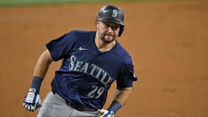 Seattle Mariners designated hitter Cal Raleigh rounds the bases after hitting a home run against the Texas Rangers on Sunday at Globe Life Field in Arlington, Texas. Seattle Mariners designated hitter Cal Raleigh rounds the bases after hitting a home run against the Texas Rangers on Sunday at Globe Life Field in Arlington, Texas.
