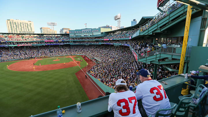 Saturday, June 8, 2024; Boston MA-Fans watch the game from the top of the Green Monster during the Savannah Bananas first Banana Ball game at Fenway Park on Saturday, June 8, 2024. Saturday, June 8, 2024; Boston MA-Fans watch the game from the top of the Green Monster during the Savannah Bananas first Banana Ball game at Fenway Park on Saturday, June 8, 2024.