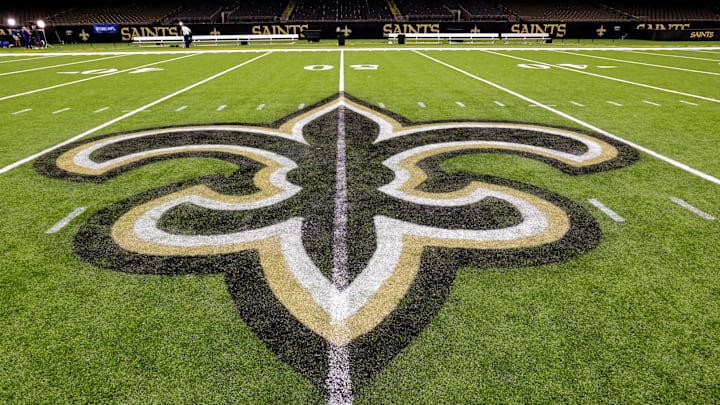 Oct 30, 2022; New Orleans, Louisiana, USA;  General view of the New Orleans Saints logo as the midfield logo fleur-de-lis after the game between the New Orleans Saints and the Las Vegas Raiders at Caesars Superdome. Mandatory Credit: Stephen Lew-Imagn Images
