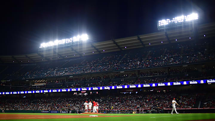 Angels pitcher Brock Burke (46) walks to the dugout after being relieved during the seventh inning at Angel Stadium on June 23.