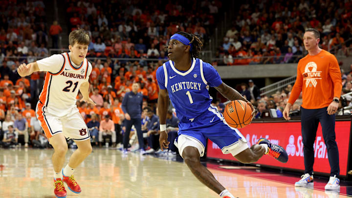 Feb 21, 2026; Auburn, Alabama, USA; Kentucky Wildcats guard Denzel Aberdeen (1) runs a play against the Auburn Tigers during the first half at Neville Arena. Mandatory Credit: John Reed-Imagn Images Feb 21, 2026; Auburn, Alabama, USA; Kentucky Wildcats guard Denzel Aberdeen (1) runs a play against the Auburn Tigers during the first half at Neville Arena. Mandatory Credit: John Reed-Imagn Images