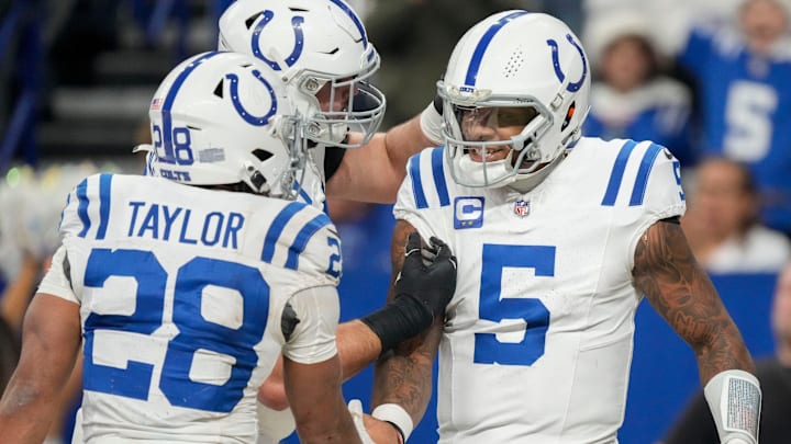 Indianapolis Colts quarterback Anthony Richardson (5) celebrates with teammates after rushing for a touchdown Sunday, Dec. 22, 2024, during a game against the Tennessee Titans at Lucas Oil Stadium in Indianapolis. Indianapolis Colts quarterback Anthony Richardson (5) celebrates with teammates after rushing for a touchdown Sunday, Dec. 22, 2024, during a game against the Tennessee Titans at Lucas Oil Stadium in Indianapolis.