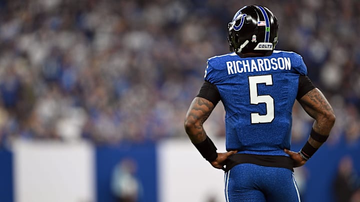 Nov 24, 2024; Indianapolis, Indiana, USA; Indianapolis Colts quarterback Anthony Richardson (5) stands on the field after a penalty is called during the second half against the Detroit Lions at Lucas Oil Stadium. Mandatory Credit: Marc Lebryk-Imagn Images
