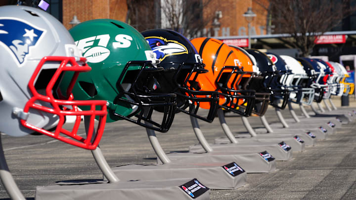 Feb 28, 2024; Indianapolis, IN, USA; A general view of large helmets of the New York Jets, Baltimore Ravens and Cincinnati Bengals at the NFL Scouting Combine Experience at Lucas Oil Stadium. Mandatory Credit: Kirby Lee-Imagn Images