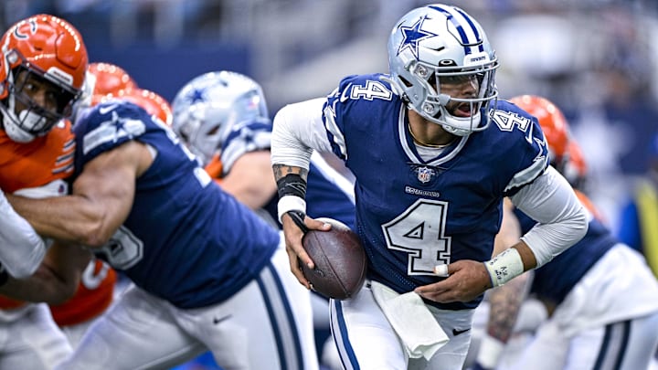 Dallas Cowboys quarterback Dak Prescott hands the ball off during the second half against the Chicago Bears.