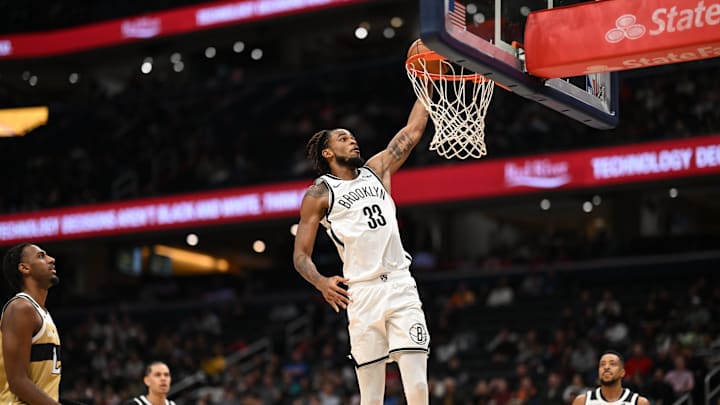 Nov 16, 2025; Washington, District of Columbia, USA;  Brooklyn Nets center Nic Claxton (33) attempts a slam dunk against the Washington Wizards during the second quarter at Capital One Arena. Mandatory Credit: Rafael Suanes-Imagn Images