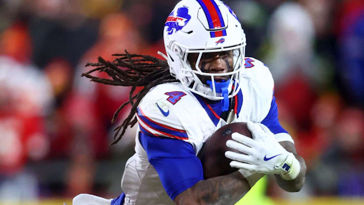 Jan 26, 2025; Kansas City, MO, USA; Buffalo Bills running back James Cook (4) rushes the ball against the Kansas City Chiefs during the second half in the AFC Championship game at GEHA Field at Arrowhead Stadium. Mandatory Credit: Mark J. Rebilas-Imagn Images