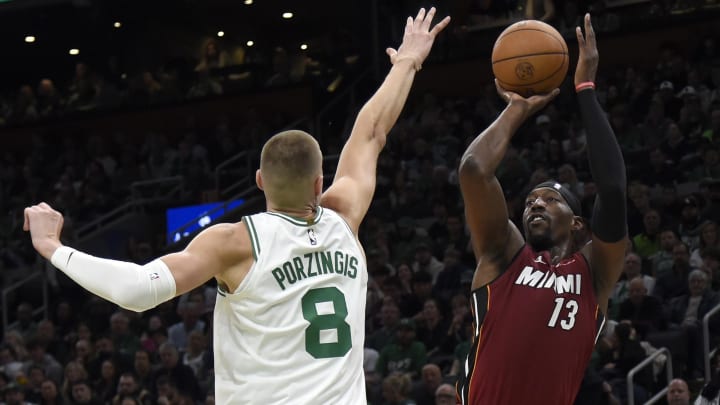 Apr 21, 2024; Boston, Massachusetts, USA; Miami Heat center Bam Adebayo (13) shoots the ball past