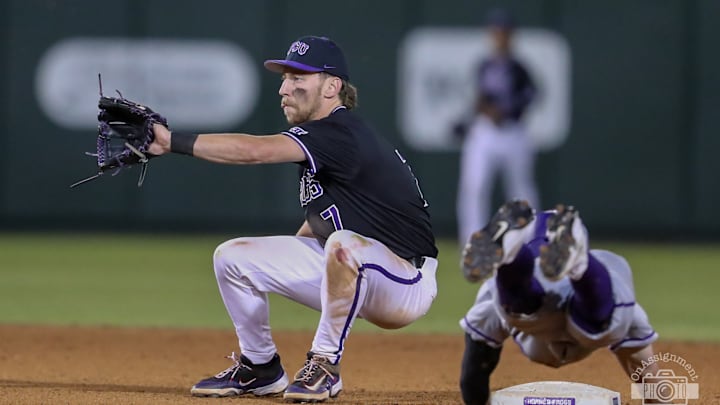 TCU second baseman Cole Cramer waiting to receive the ball from Nolan Traeger, 02/25/2025