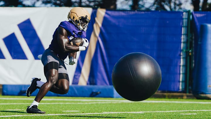 Adam Mohammed tries to outrun a practice ball that is sent his way to test his balance. Adam Mohammed tries to outrun a practice ball that is sent his way to test his balance.