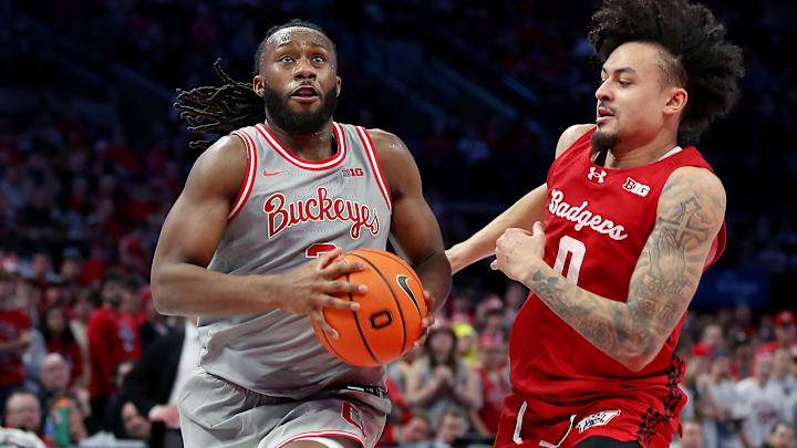 Feb 17, 2026; Columbus, Ohio, USA; Ohio State Buckeyes guard Bruce Thornton (2) drives to the basket as Wisconsin Badgers guard Braeden Carrington (0) defends during the second half at Value City Arena. Mandatory Credit: Joseph Maiorana-Imagn Images Feb 17, 2026; Columbus, Ohio, USA; Ohio State Buckeyes guard Bruce Thornton (2) drives to the basket as Wisconsin Badgers guard Braeden Carrington (0) defends during the second half at Value City Arena. Mandatory Credit: Joseph Maiorana-Imagn Images