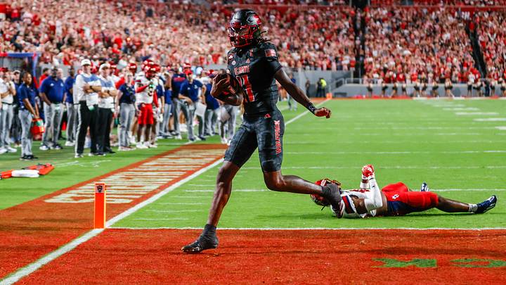 Sep 11, 2026; Raleigh, North Carolina, USA; NC State Wolfpack quarterback CJ Bailey (11) celebrates a touchdown during the first half of the game against Richmond Spiders at Carter-Finley Stadium. Mandatory Credit: Jaylynn Nash-Imagn Images Sep 11, 2026; Raleigh, North Carolina, USA; NC State Wolfpack quarterback CJ Bailey (11) celebrates a touchdown during the first half of the game against Richmond Spiders at Carter-Finley Stadium. Mandatory Credit: Jaylynn Nash-Imagn Images