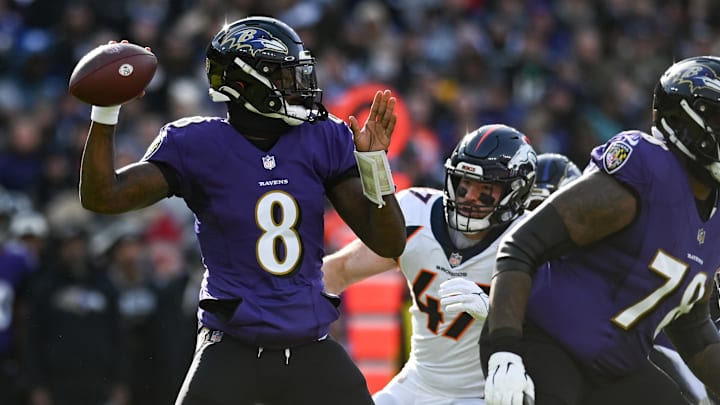 Dec 4, 2022; Baltimore, Maryland, USA;  Baltimore Ravens quarterback Lamar Jackson (8) drops back to pass during the first quarter against the Denver Broncos at M&T Bank Stadium. Mandatory Credit: Tommy Gilligan-Imagn Images