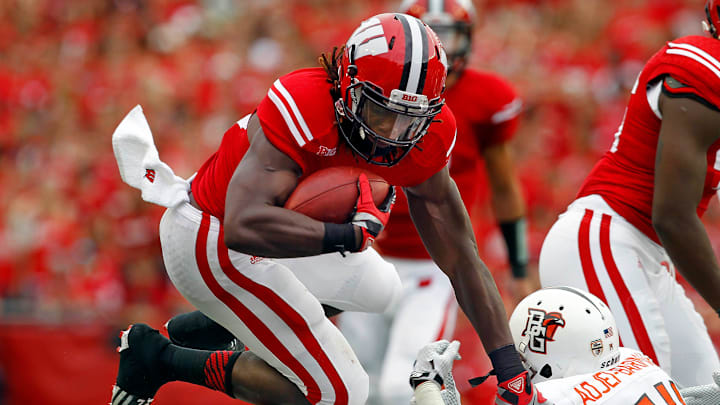 Wisconsin running back Melvin Gordon picks up a first down with this leap in the first half during Wisconsin's 68-17 win over Bowling Green at Camp Randall Stadium in Madison, Wis., on Saturday, Sept. 20, 2014. Wisconsin running back Melvin Gordon picks up a first down with this leap in the first half during Wisconsin's 68-17 win over Bowling Green at Camp Randall Stadium in Madison, Wis., on Saturday, Sept. 20, 2014.