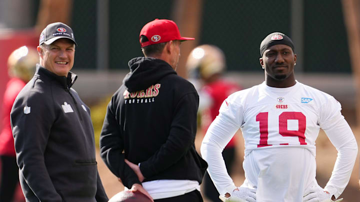 San Francisco 49ers general manager John Lynch (L), head coach Kyle Shanahan (C) and wide receiver Deebo Samuel (R)