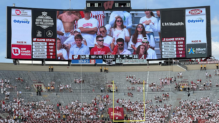 Sep 14, 2024; Madison, Wisconsin, USA; Fans in the student section depart a game between the Wisconsin Badgers and the Alabama Crimson Tide during the fourth quarter at Camp Randall Stadium. Alabama won 42-10. Mandatory Credit: Mark Hoffman/USA TODAY Network via Imagn Images