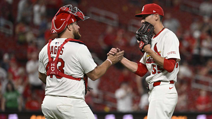 Sep 16, 2025; St. Louis, Missouri, USA; St. Louis Cardinals catcher Pedro Pages (43) and relief pitcher Riley O'Brien (55) celebrates their victory over the Cincinnati Reds at Busch Stadium. Mandatory Credit: Joe Puetz-Imagn Images
