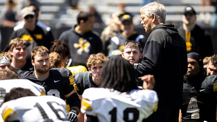 Apr 26, 2025; Iowa City, IA, USA; Iowa head coach Kirk Ferentz talks with players during a spring NCAA football open practice at Kinnick Stadium. Mandatory Credit: Joseph Cress-The Des Moines Register