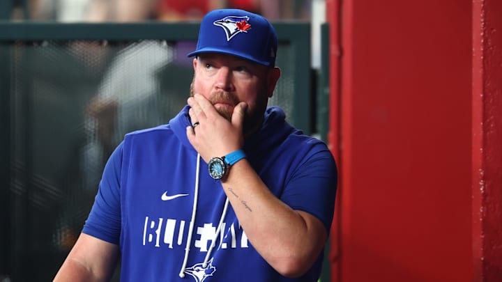 Toronto Blue Jays manager John Schneider in the dugout. 