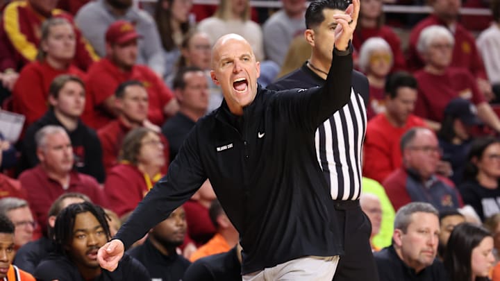 Jan 10, 2026; Ames, Iowa, USA; Oklahoma State Cowboys head coach Steve Lutz watches his team play the Iowa State Cyclones during the second half at James H. Hilton Coliseum. Mandatory Credit: Reese Strickland-Imagn Images