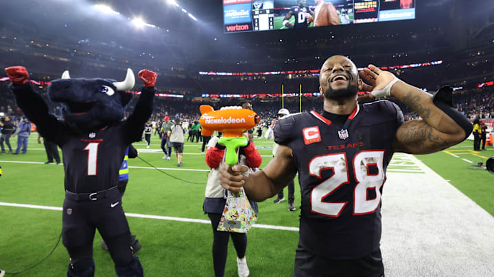 Jan 11, 2025; Houston, Texas, USA; Houston Texans running back Joe Mixon (28) walks off the field after the win against the Los Angeles Chargers in an AFC wild card game at NRG Stadium. Mandatory Credit: Troy Taormina-Imagn Images Jan 11, 2025; Houston, Texas, USA; Houston Texans running back Joe Mixon (28) walks off the field after the win against the Los Angeles Chargers in an AFC wild card game at NRG Stadium. Mandatory Credit: Troy Taormina-Imagn Images