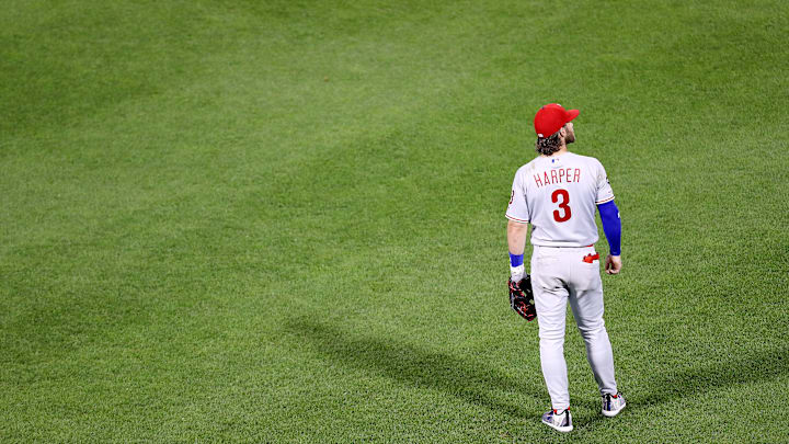 Chances of Phillies' Bryce Harper returning to the outfield get slimmer after Guerrero Jr. extension.