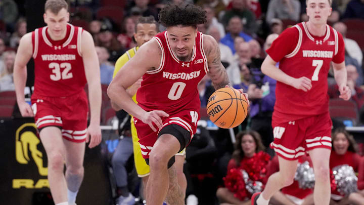 Wisconsin guard Braeden Carrington (0) runs down court on a fast break during the first half of their semifinal game against Michigan in the Big Ten tournament Saturday, March 14, 2026 at the United Center in Chicago, Illinois. Wisconsin guard Braeden Carrington (0) runs down court on a fast break during the first half of their semifinal game against Michigan in the Big Ten tournament Saturday, March 14, 2026 at the United Center in Chicago, Illinois.