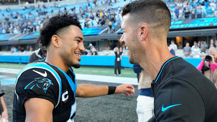 Nov 3, 2024; Charlotte, North Carolina, USA; Carolina Panthers quarterback Bryce Young (9) with head coach Dave Canales after the game at Bank of America Stadium. Mandatory Credit: Bob Donnan-Imagn Images