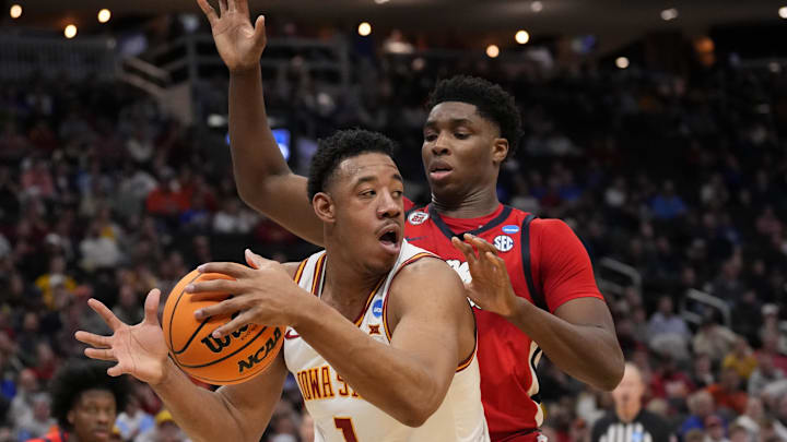 Mar 23, 2025; Milwaukee, WI, USA;  Iowa State Cyclones center Dishon Jackson (1) controls the ball against Mississippi Rebels forward Malik Dia (0) during the second half in the second round of the NCAA Tournament at Fiserv Forum. Mandatory Credit: Jeff Hanisch-Imagn Images