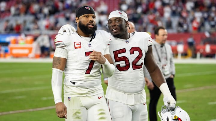 Dec 15, 2024; Glendale, Arizona, USA; Arizona Cardinals linebacker Kyzir White (7) and linebacker Victor Dimukeje (52) against the New England Patriots at State Farm Stadium. Mandatory Credit: Mark J. Rebilas-Imagn Images