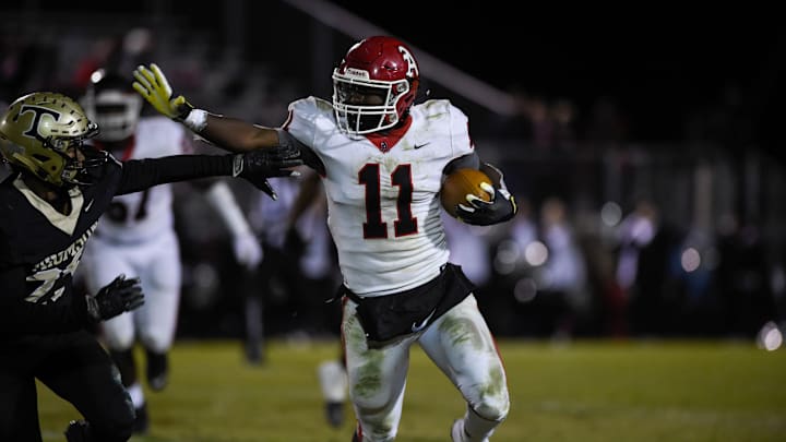 Appling County #11 Dennis Mims works to fight off Thomson defenders during their game against Thomson at The Brickyard in Thomson on Friday, Nov. 26, 2021. Appling County defeated Thomson with a score of 21-7.

Sports Thomson And Appling County Football
